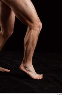 Tomas Salek 1 calf flexing nude side view 0006.jpg